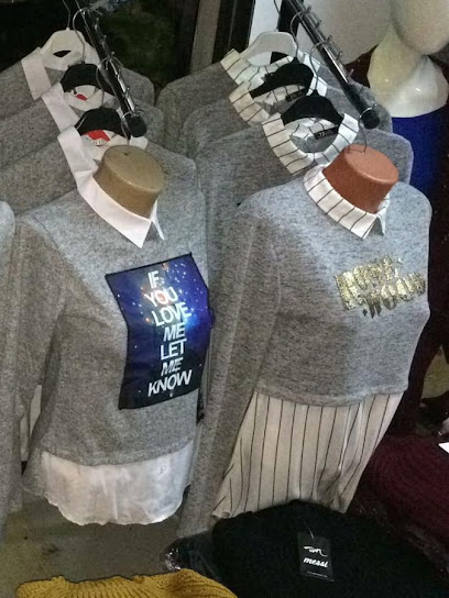 Bella's Boutique Strada Burgundia Mare 7